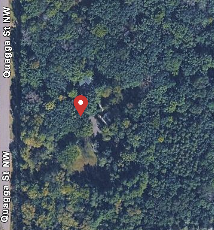 Aerial view of 25367 Quagga Street NW, Zimmerman, MN on a wooded 2.2-acre lot